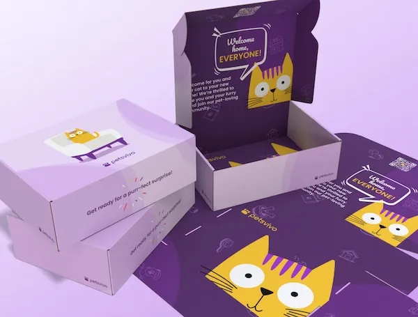 PetsVivo PetBox packaging: purple boxes printed with a friendly cat and Welcome home, everyone! on the unfolded liner
